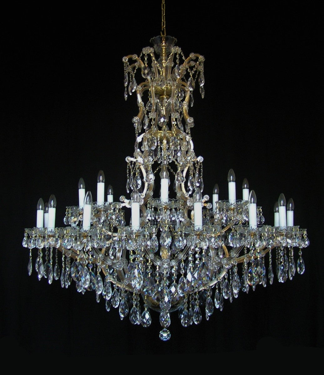 Grand chandelier with crystal elements on a black background