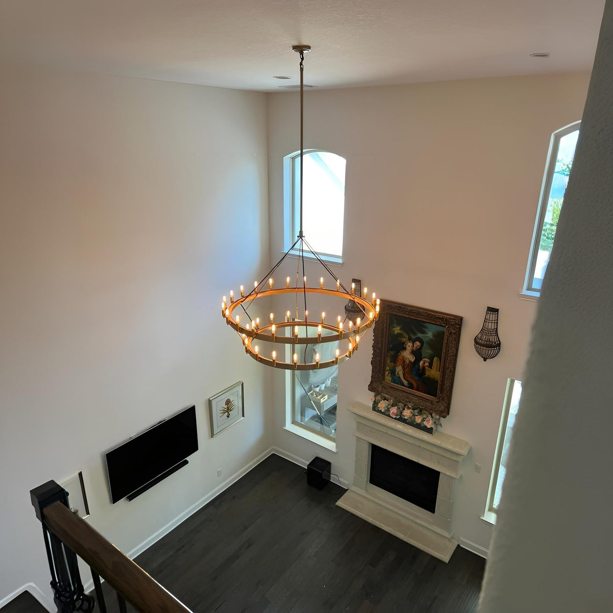 Elaris 50 Inch Tubular Candle Wagon Wheel Tiered Chandelier