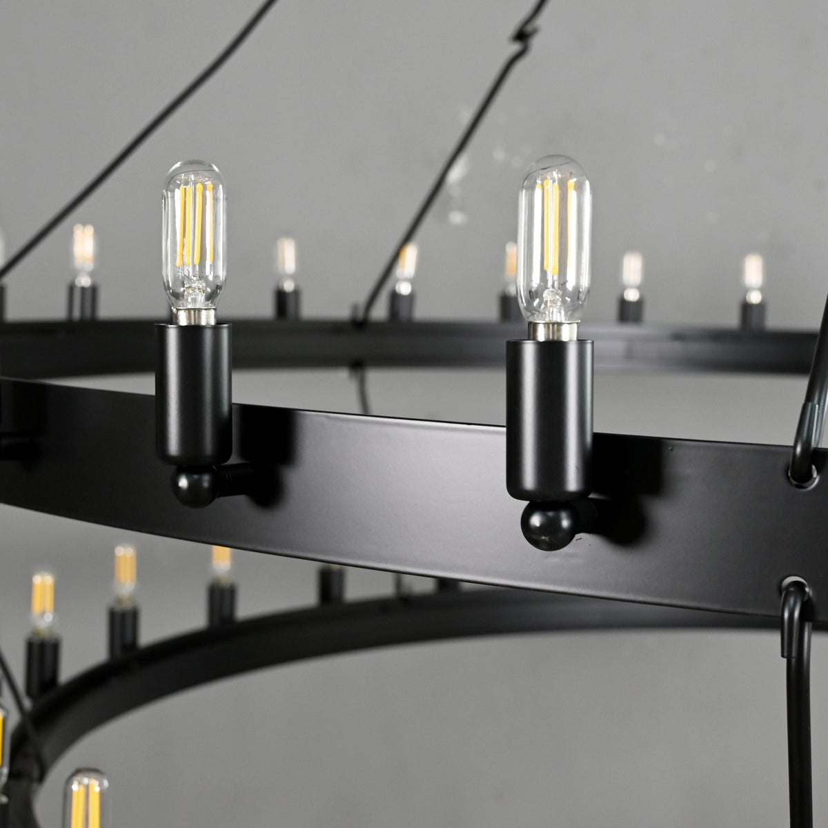 Elaris 63 Inch Tubular Candle Wagon Wheel Tiered Chandelier