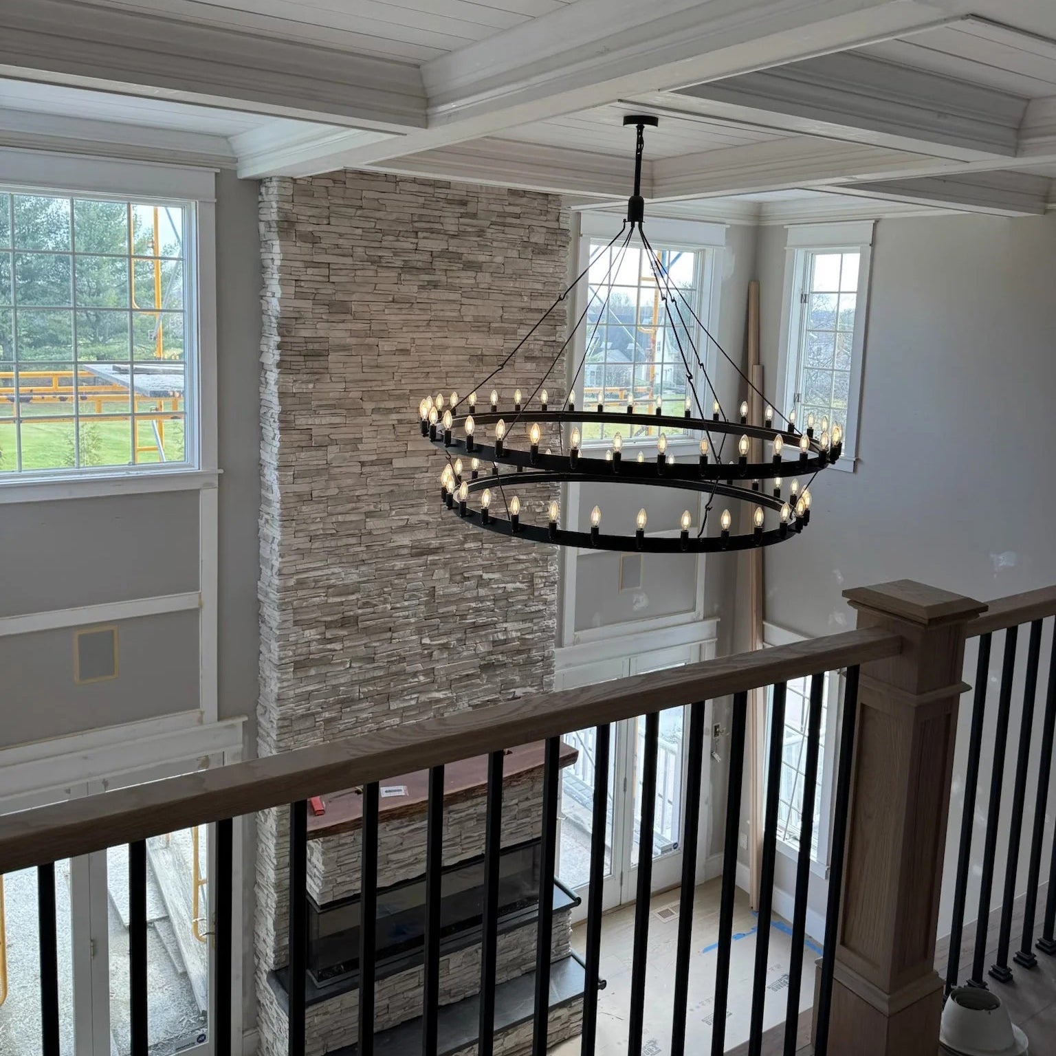 Elaris 72 Inch Tubular Candle Wagon Wheel Tiered Chandelier