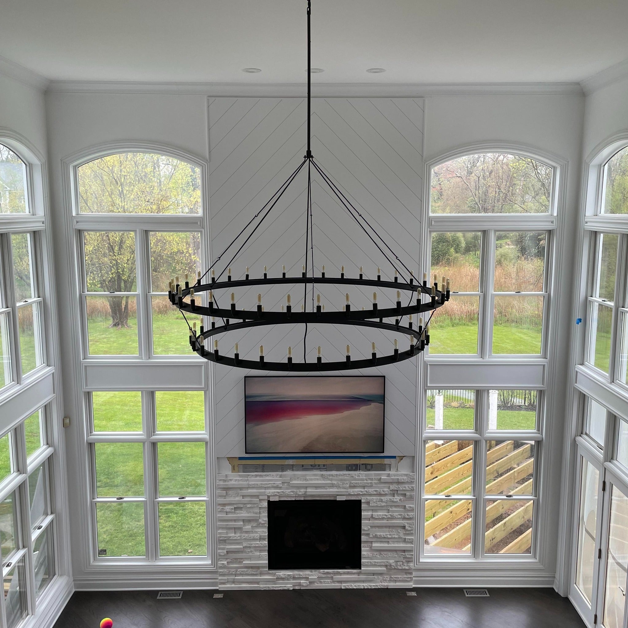 Elaris 72 Inch Tubular Candle Wagon Wheel Tiered Chandelier