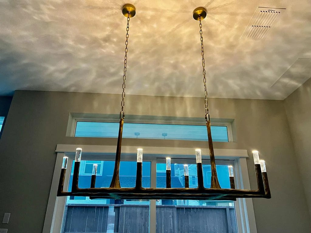 Aurevon 54 Inch Forged Candlestick Linear Chandelier