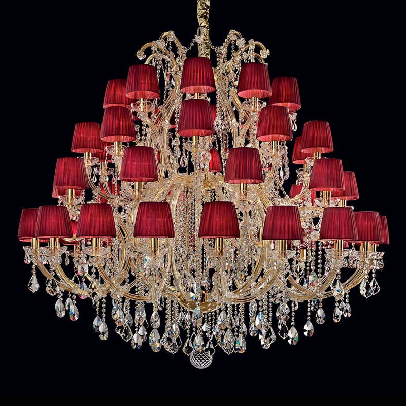 Chandelier with red lampshades and crystal