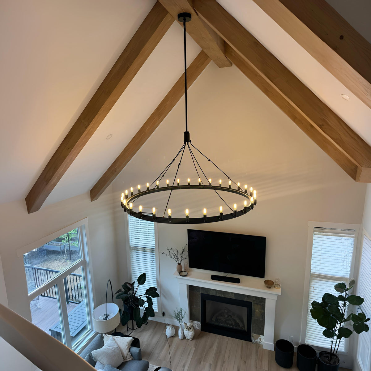 Elaris 63 Inch Tubular Candle Wagon Wheel Chandelier