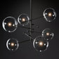 Darrance Modern Glass Globe Six-Arm Chandelier 54" chandelier Kevin Studio Inc Black  